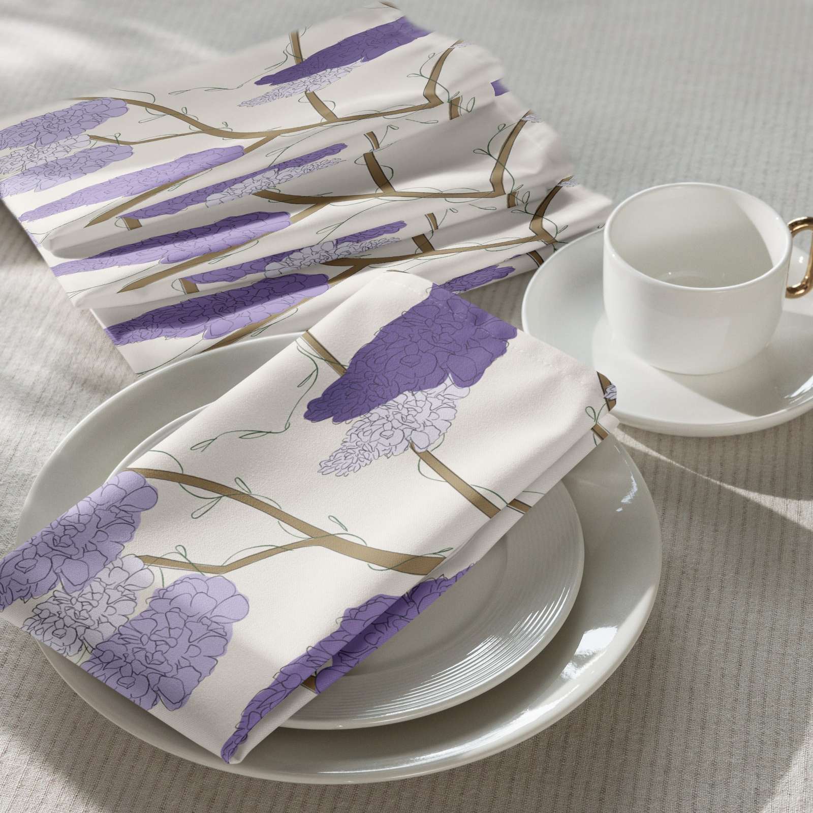 Product Cloth napkin set in Wisteria Trail Ivory – broadcloth dining linen on a table