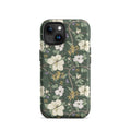 Magnolia and dogwood MagSafe iPhone case on evergreen background iPhone 15